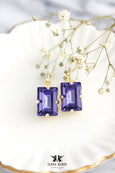 These Purple Tanzanite Crystal Earrings are perfect for the bride&#39;s mother or any special occasion. The stunning violet hue complements elegant attire, making these drop earrings a beautiful choice for celebrating in style.