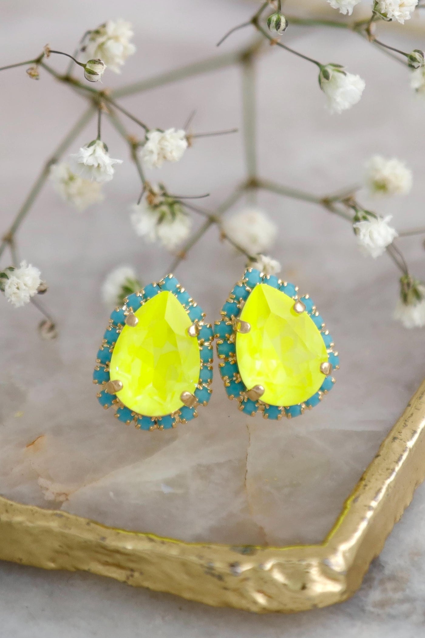 Handmade neon Yellow stud earrings in a stunning new color, perfect for brightening any look. Embellished with Swarovski© crystals, these pear-shaped earrings are a unique and stylish gift for women.